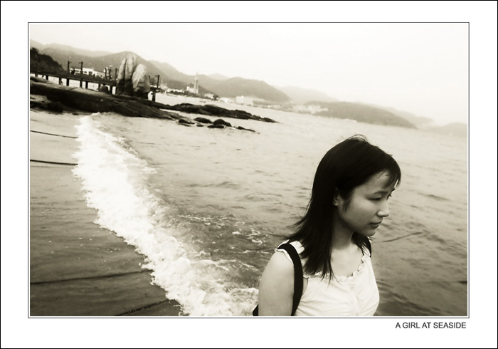 a girl at the seaside 摄影 象话