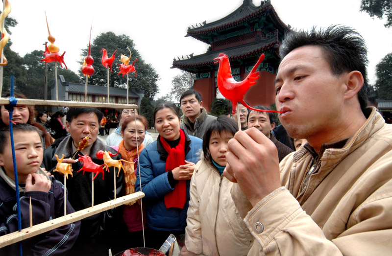 吹鸡祈福 摄影 阳光客