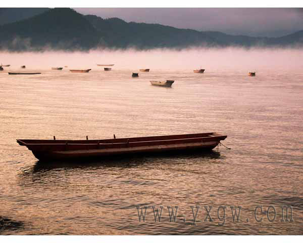 泸沽湖主人 摄影 九仙