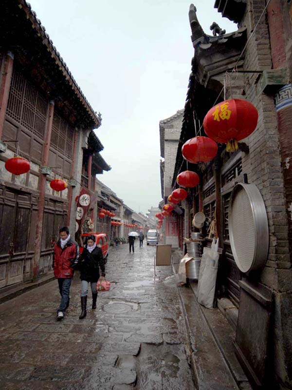 周村 大街 雨中 摄影 足球起源地