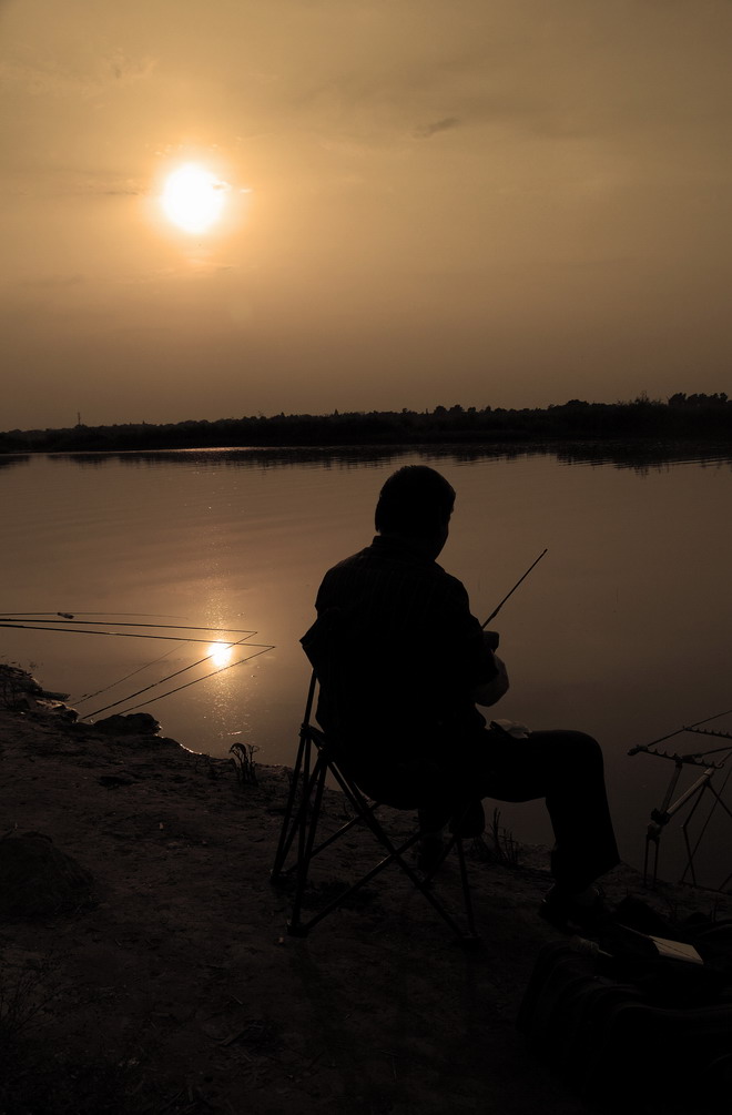 夕阳渔人 摄影 乷蘿雙树圓