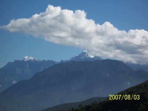 玉龙雪山和梅里雪山在一起 摄影 shaykh