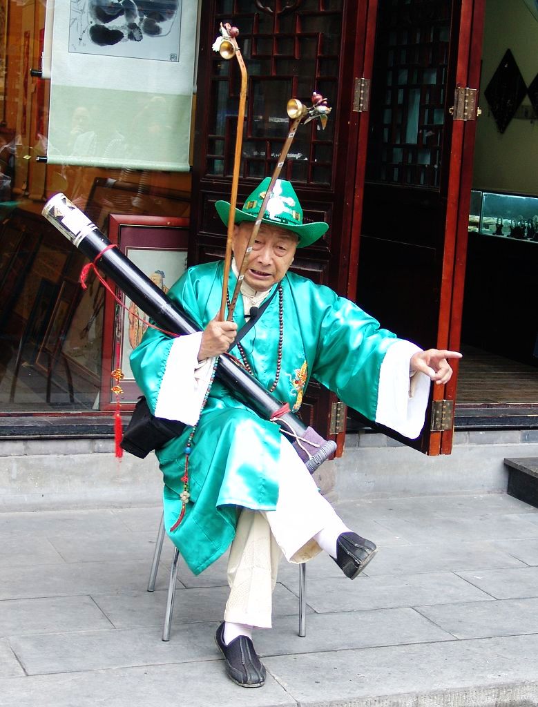 店前说书人 摄影 双眸看客