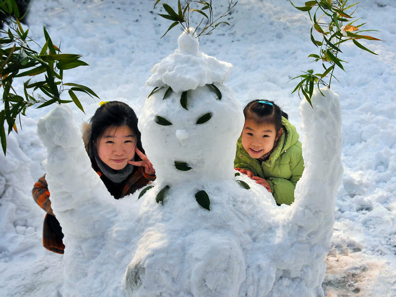 <"我和雪人是好朋友!"> 摄影 Robbin