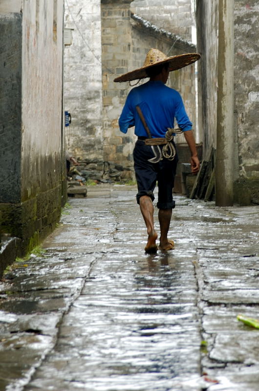 雨中的农家汉子 摄影 jtvwzg