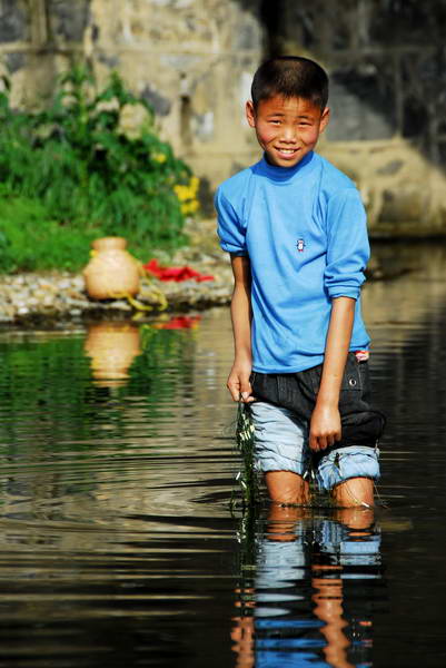 网鱼少年 摄影 oto