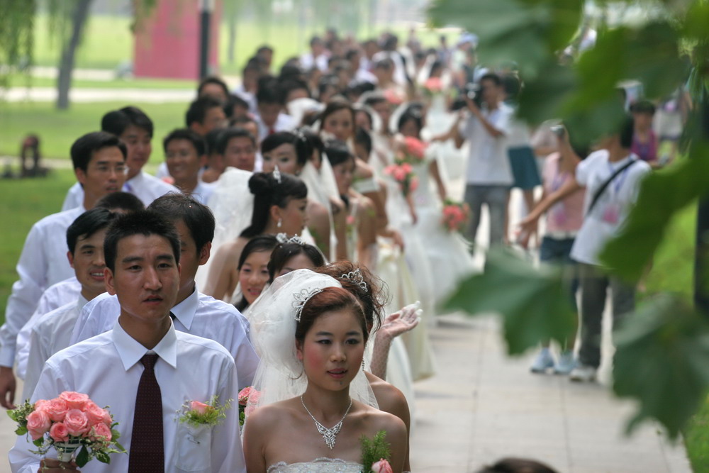 奥运开幕这一天 集体婚礼 摄影 白菜顶着雪