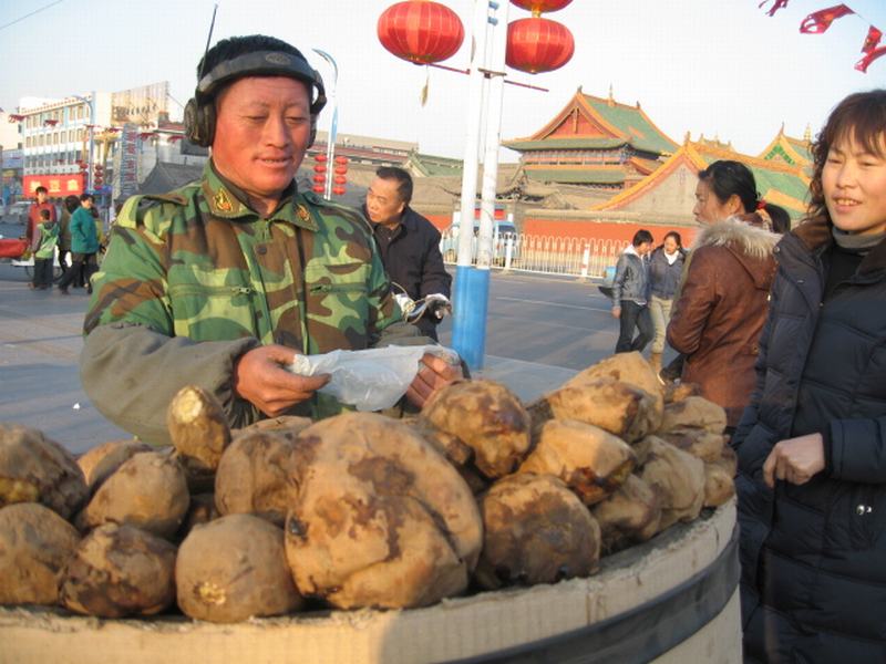 卖烤红薯的'大脸猫' 摄影 呼居鲁者