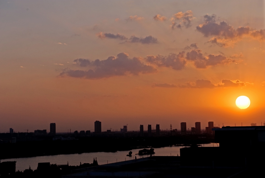 自家洋台上拍摄城市夕阳 摄影 老赵