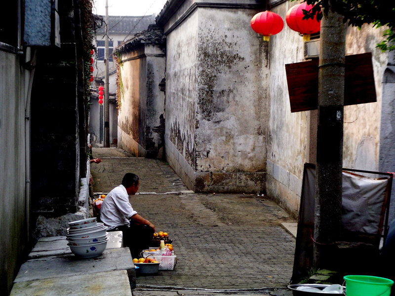 夕阳西下 卖货人在街头 摄影 老灵魂