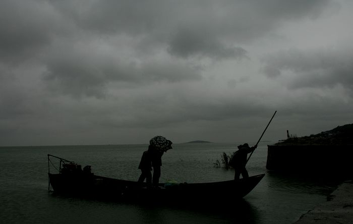 风雨无阻 摄影 一枚青橄榄