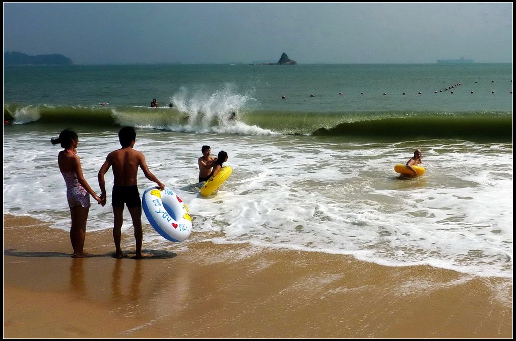 秋日海滩冲浪 摄影 华绿