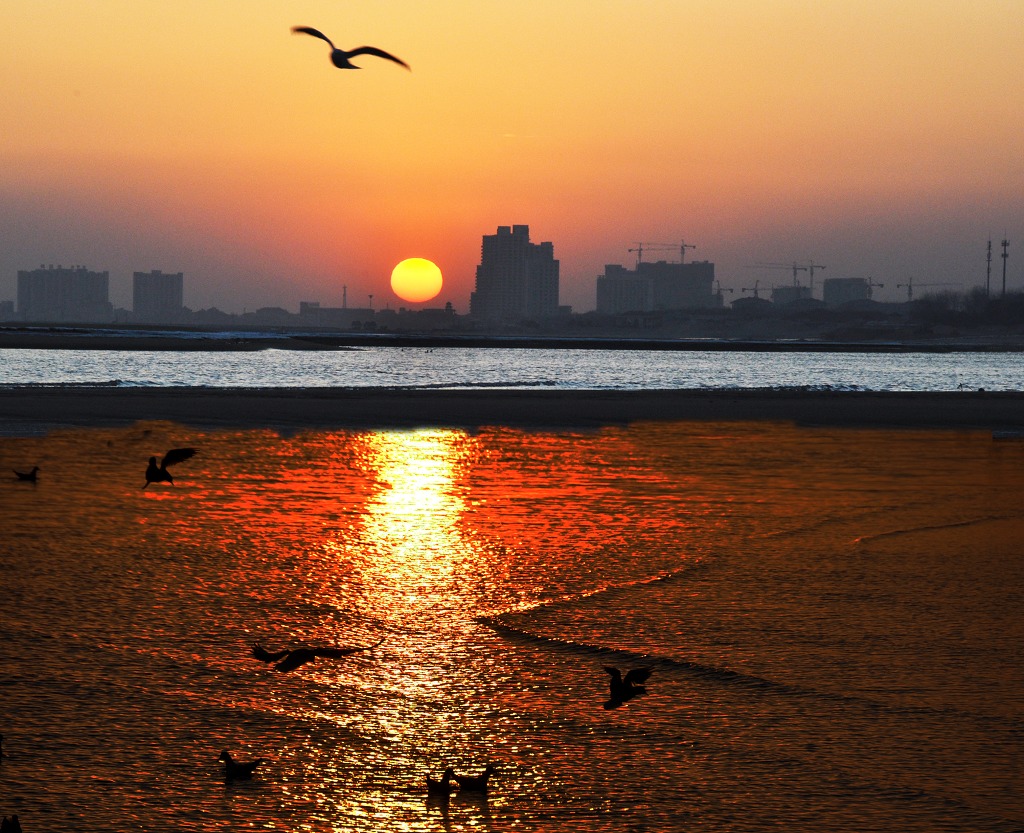 夕阳照碧海 摄影 小玩童