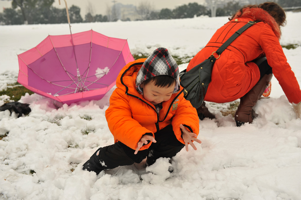 母子雪中乐 摄影 老牛啦