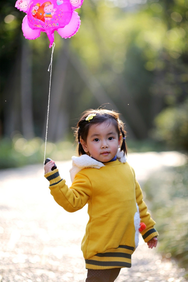 拿气球的小女孩 摄影 猴宝宝面包树