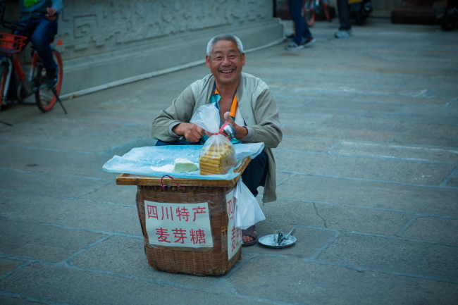 卖麦牙糖 摄影 duobaoli