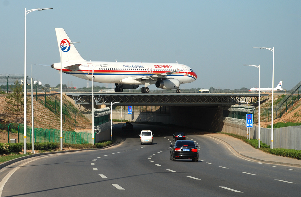 去机场  乘飞机回家过年 摄影 zhangxunyong